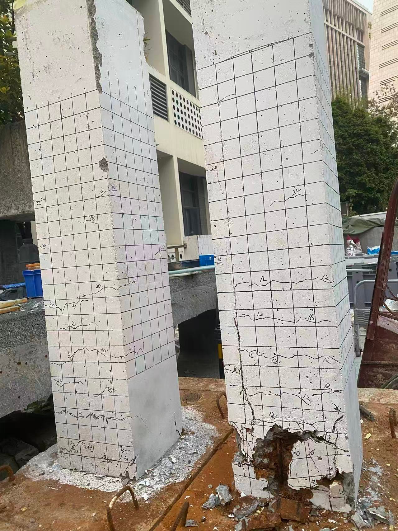 Damaged column specimens after structural loading