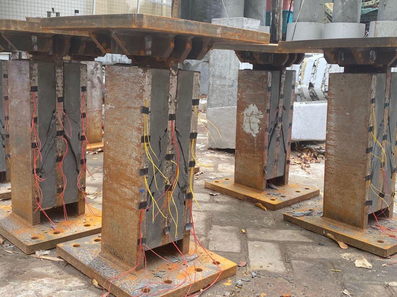 Instrumented specimens after structural loading and crack development